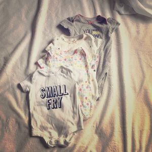 4, six month baby girls onesies, varying colors